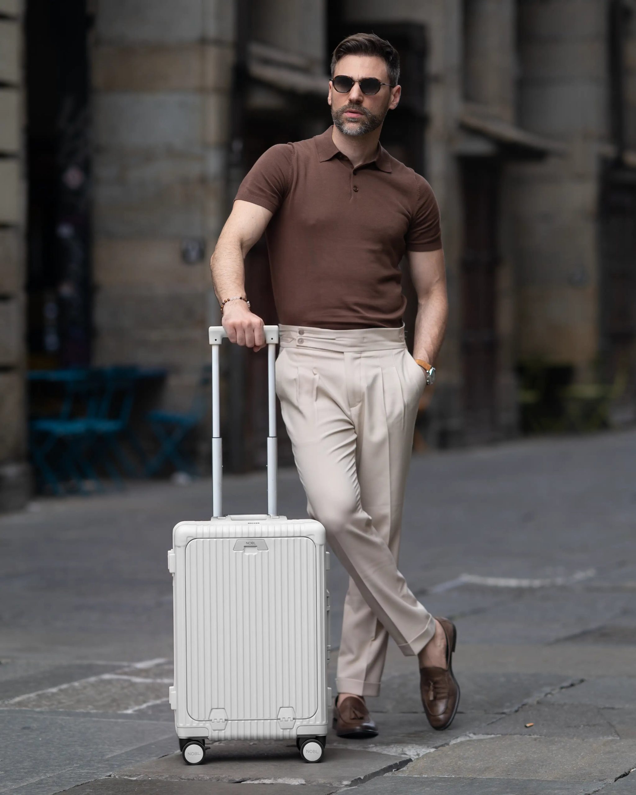 NOBL_Carry-On_All_In_One_Ivory_Male_Model_Lifestyle.jpg