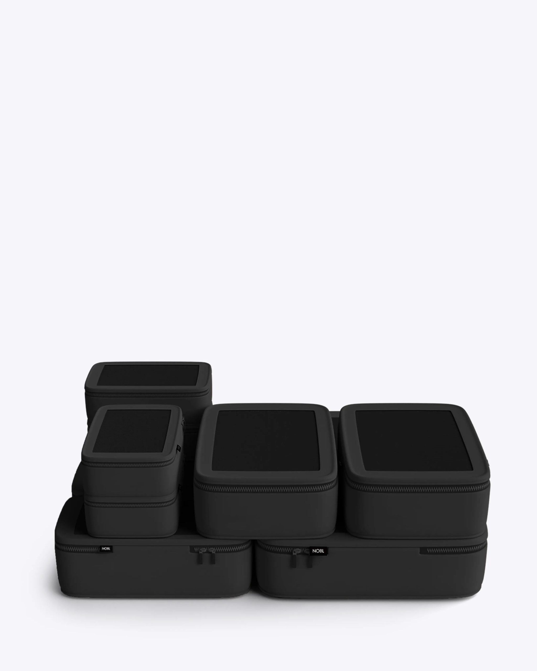 nobl-compressible-packing-cubes-black.jpg